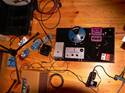 My usual studio pedal mess consisting of JAM tremelo and chorus pedals, custom Jeorge Tripps/Dunlop Fuzz Face, trusty Maxon AD-900 delay, Occtone boost and modded DS-1, MJM London Fuzz 2 and '60s Vibe, Dunlop Octavio, etc...